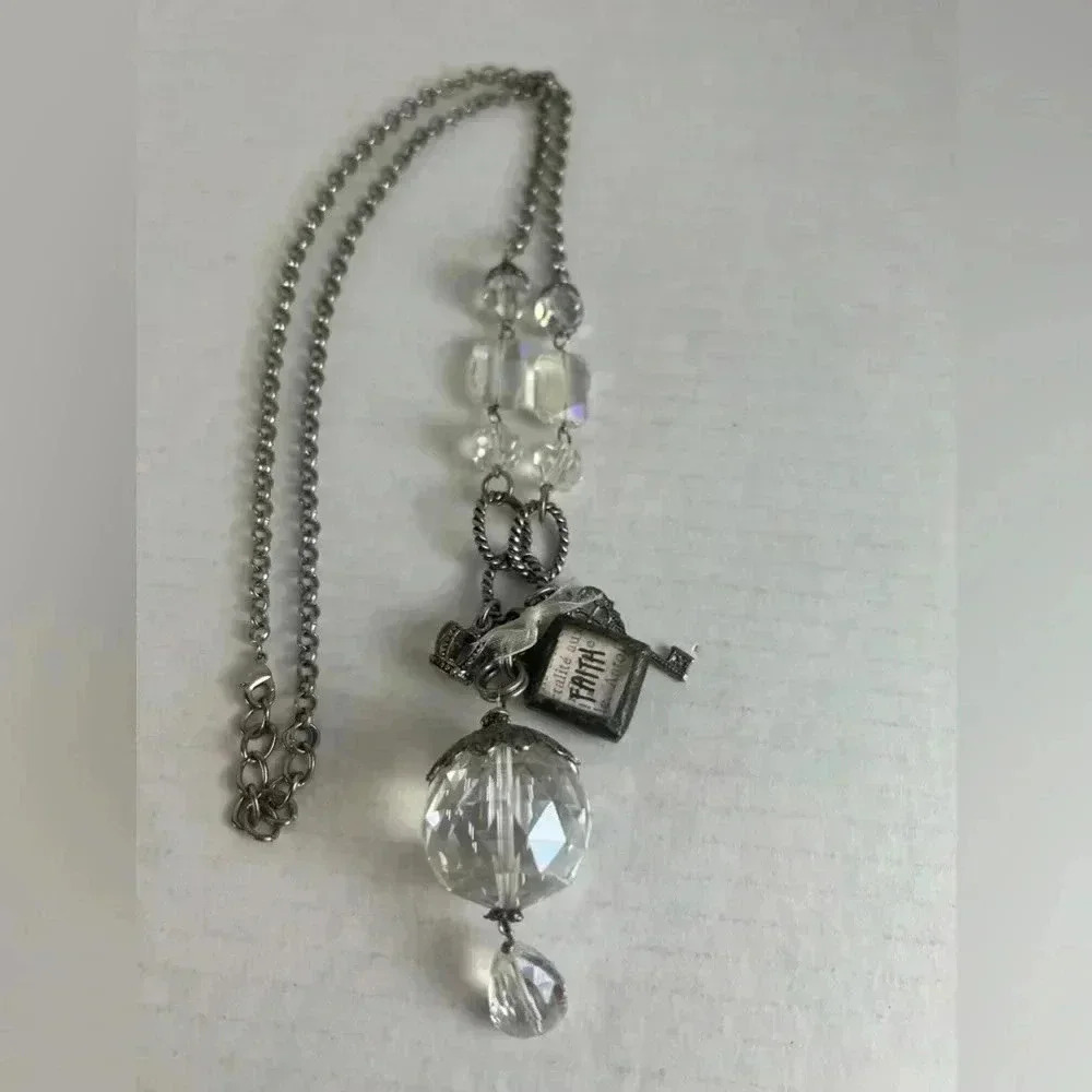 Faith Statement Necklace with Crystal Accents and Charms.